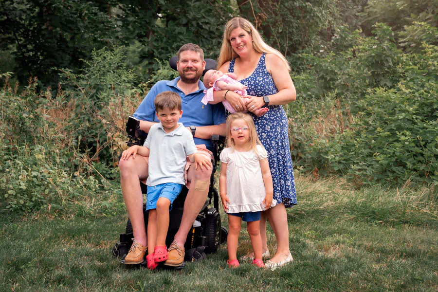 johnson family portrait in the backyard summer 2024